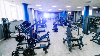 Fotobehang Fitness Leeg modern fitnesscentrum met apparatuur  © Vadim