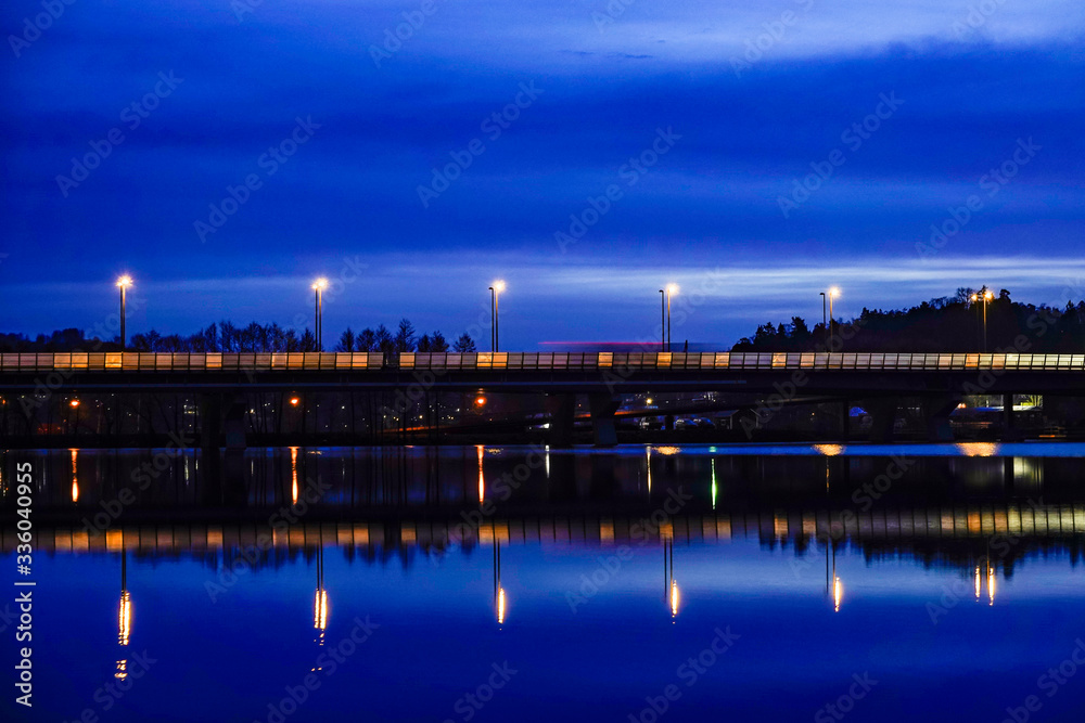 Stockholm, Sweden  Night landscape over Lake Mälaren looking towards Varby and the E4 highway.