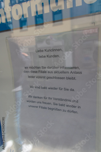 German Sign in front of a store in Frankfurt am Main about the Corona virus pandemic situation