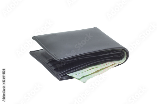 Black wallet with money on isolated background;