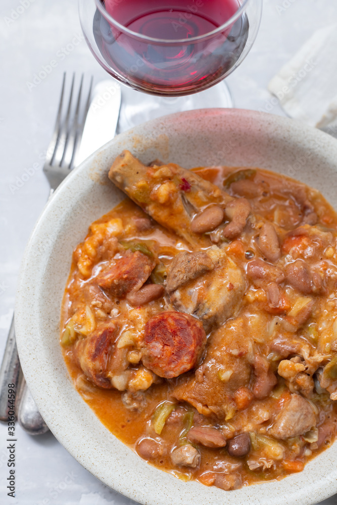 typical portuguese dish beans with cabbafe and smoked meat in dish typical portuguese dish beans with cabbafe and smoked meat in dish