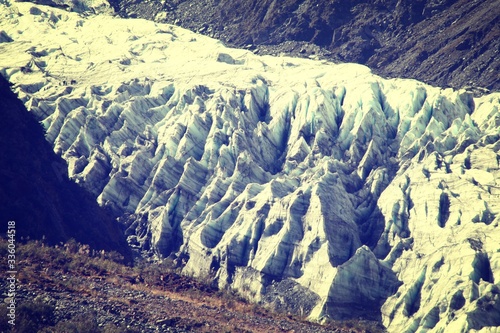 Fox Glacier in New Zealand. Retro filtered color style. photo