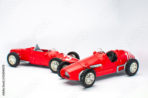 Red toy car on white background