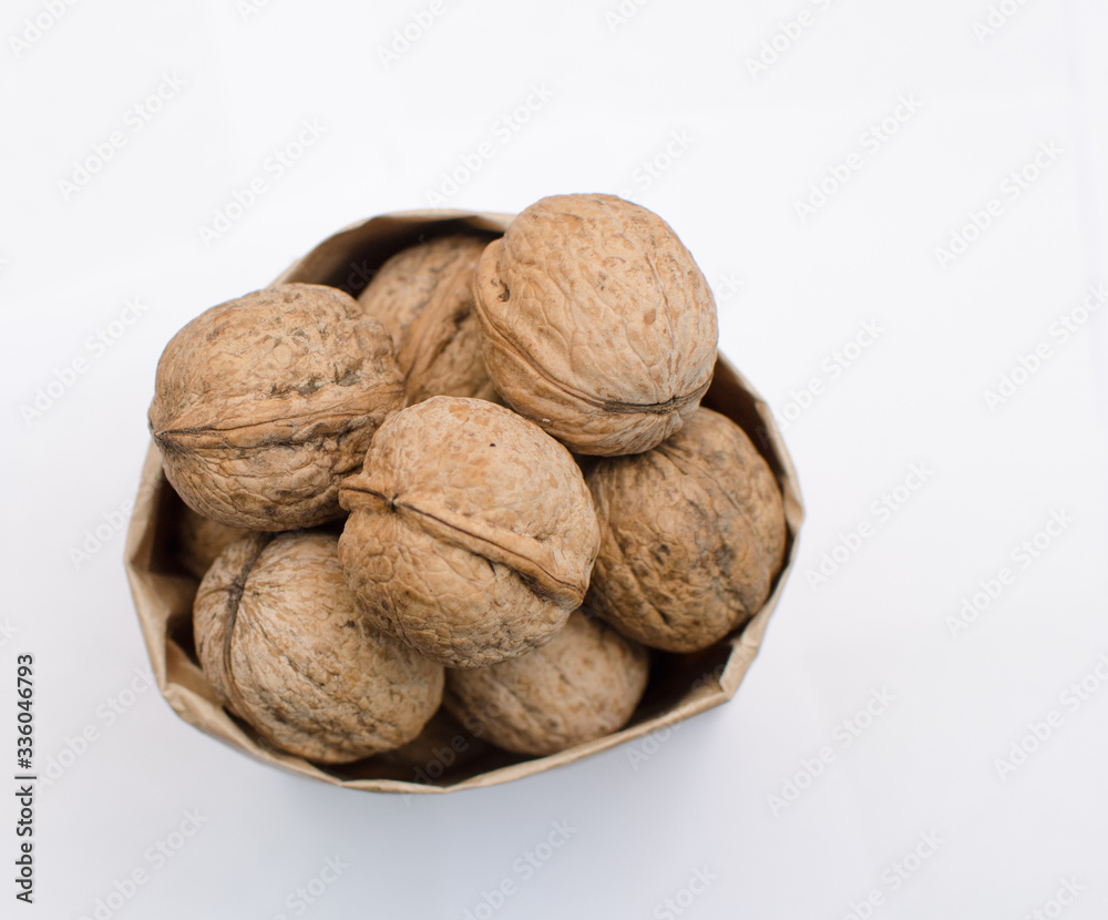 fresh walnuts, superfood, healthy foods, nuts on a wooden surface, close-up fresh walnuts, superfood, healthy foods, nuts on a wooden surface, close-up