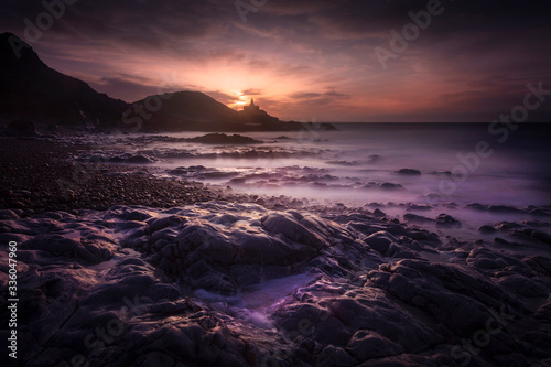 Daybreak over Bracelet Bay on the Gower peninsula in Swansea, South Wales, UK