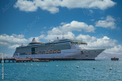 Cruies Ship Disembarking Passengers in Sunny Port