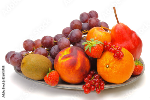 mixed fruit plate on white background
