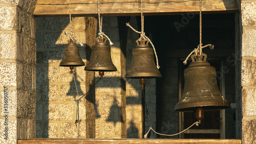 Photography Bells at the Church on top of the Mount Athos in sinrise rays