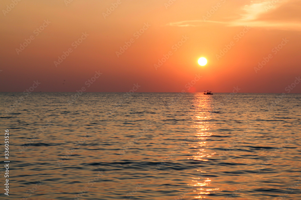 The boat on the sea before sunset at nature seascape in thailand