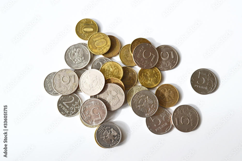 A coin costs two rubles, five rubles, ten ruble coins on a white background A coin costs two rubles, five rubles, ten ruble coins on a white background