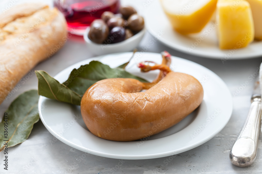 typical portuguese smoked sausage farinheira on white dish typical portuguese smoked sausage farinheira on white dish