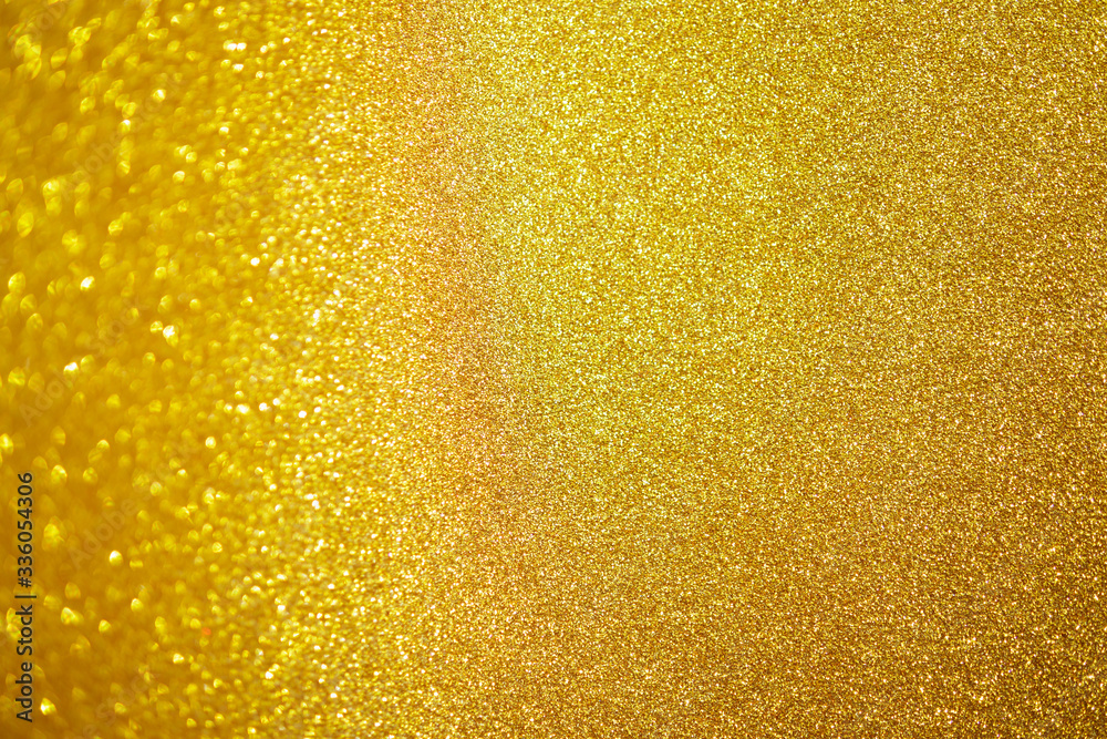 Abstract gold glitter sparkle with bokeh light background