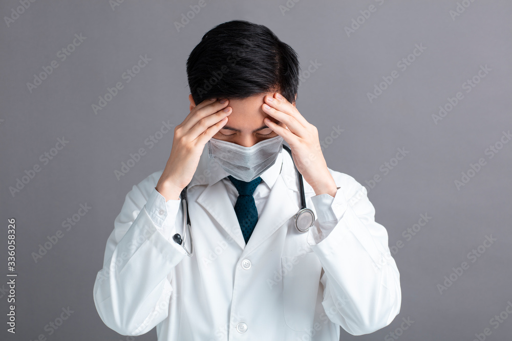 stress and tired young Doctor Wear Medical Mask stress and tired young Doctor Wear Medical Mask