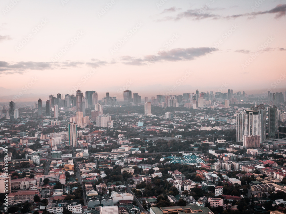 Aerial Cityscape of Quezon City in Metro Manila, Philippines while sunrise Aerial Cityscape of Quezon City in Metro Manila, Philippines while sunrise