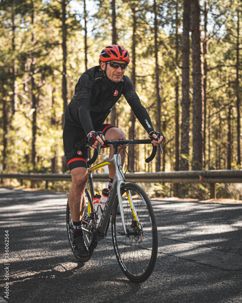 Fototapeta premium man riding a bike