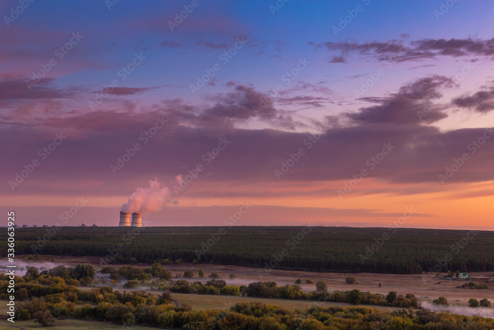 Landscape Cooling Towers of a Nuclear Power Plant at Dawn