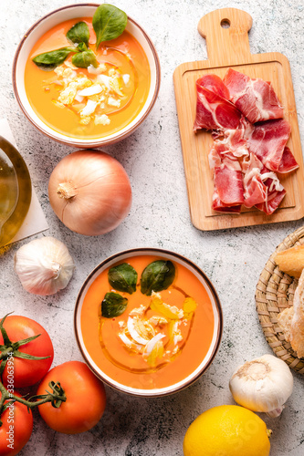 Salmorejo Soup With Ham And Eggs In A Bowl. Vertical top view