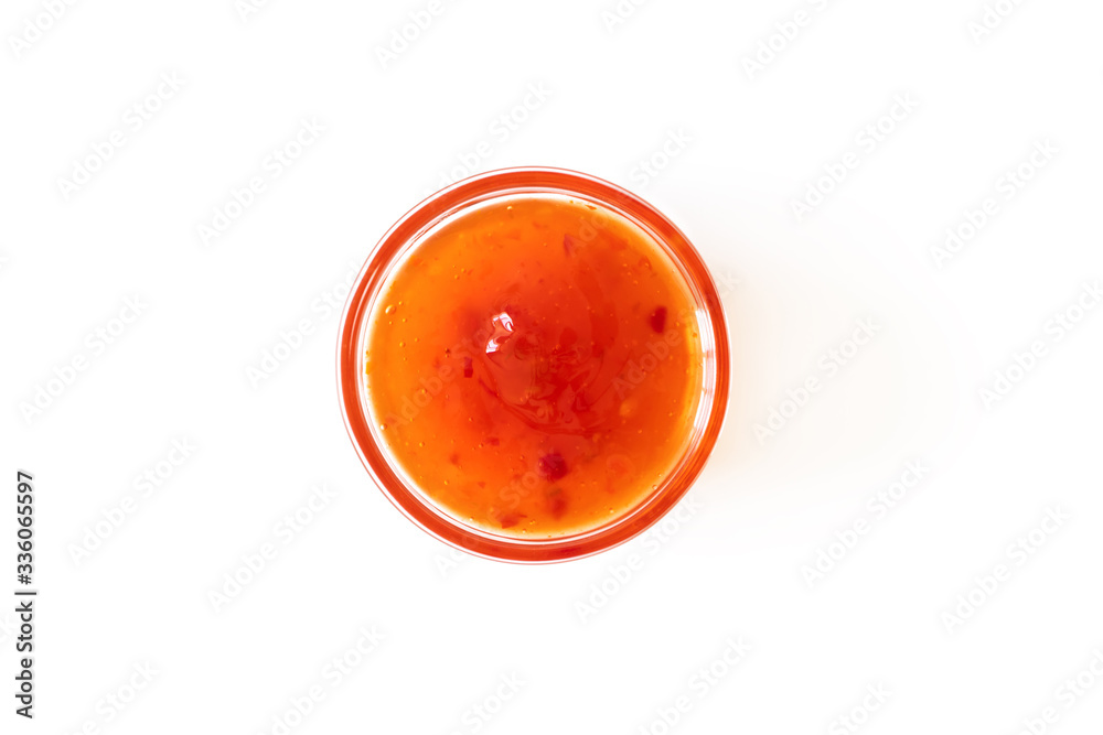 Sweet chili sauce in glass bowl isolated on white background, above. Seasoning and dip Sweet chili sauce in glass bowl isolated on white background, above. Seasoning and dip