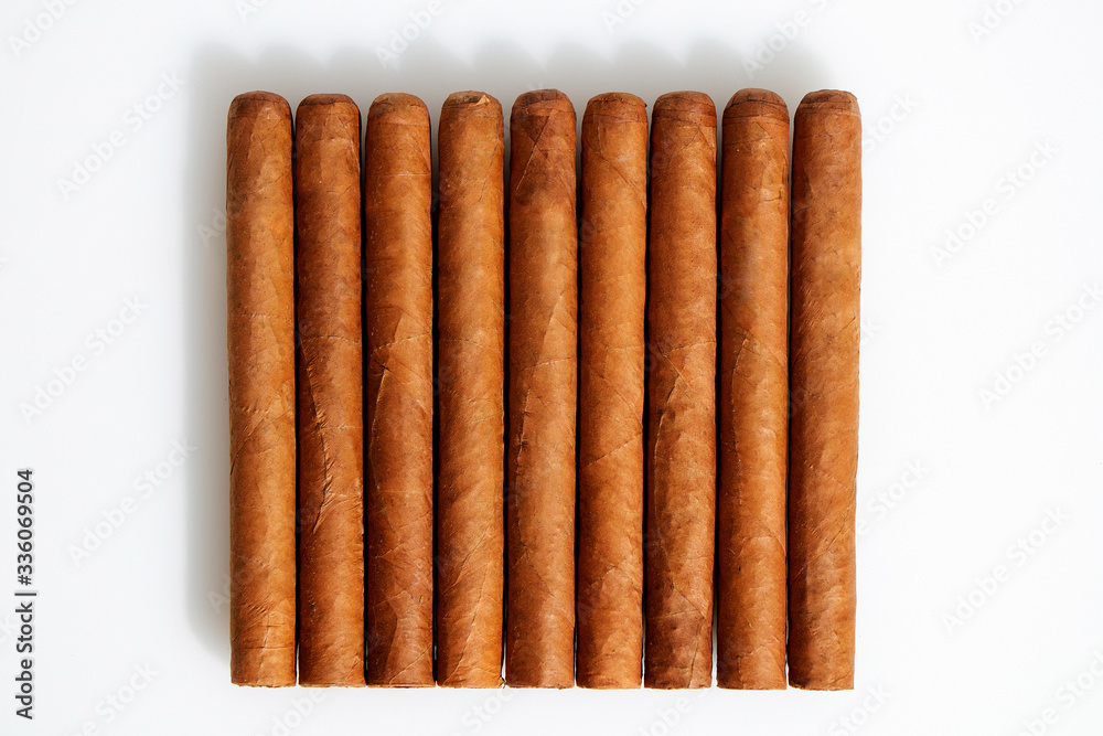 Cuban cigars on a white background Cuban cigars on a white background