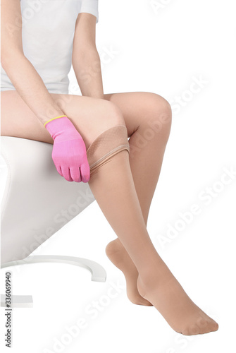 Closed toe calves. Compression Hosiery. Medical stockings, tights, socks, calves and sleeves for varicose veins and venouse therapy. Clinical knits. Sock for sports isolated on white background photo