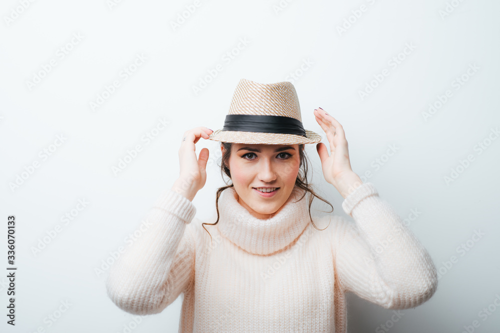 beautiful girl with hat posing in studio beautiful girl with hat posing in studio