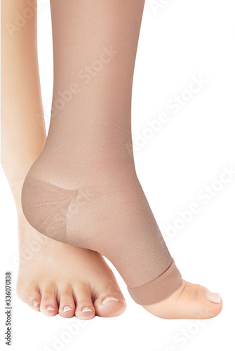 Open toe calves. Compression Hosiery. Medical stockings, tights, socks, calves and sleeves for varicose veins and venouse therapy. Clinical knits. Sock for sports isolated on white background © Maksim