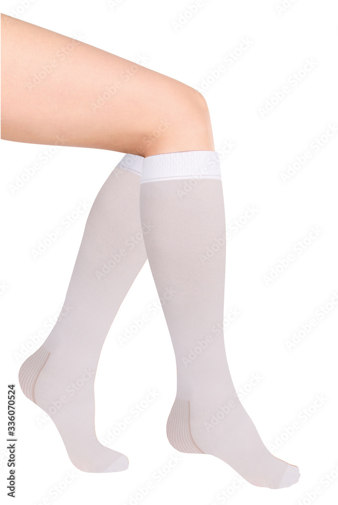 Anti-embolic calves. Compression Hosiery. Medical stockings, tights, socks, calves and sleeves for varicose veins and venouse therapy. Clinical knits. Sock for sports isolated on white background Anti-embolic calves. Compression Hosiery. Medical stockings, tights, socks, calves and sleeves for varicose veins and venouse therapy. Clinical knits. Sock for sports isolated on white background