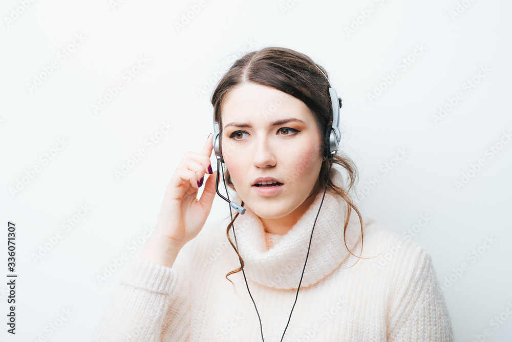on a white background girl with headphones on a white background girl with headphones