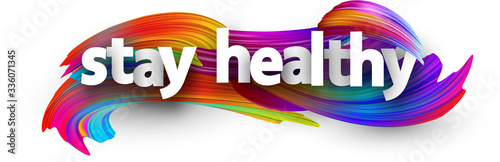 Stay healthy sign over brush strokes background.