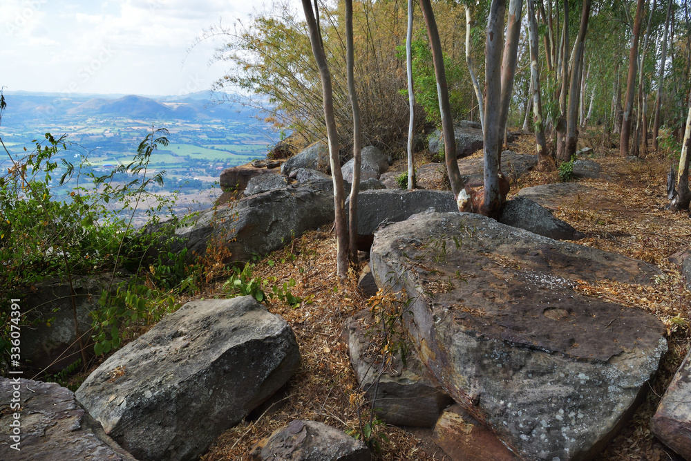 The large rocks on the mountain are arranged continuously.