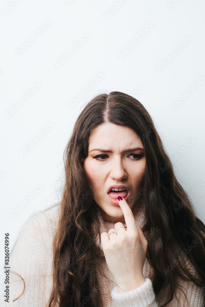 on a white background a young girl with long hair nausea on a white background a young girl with long hair nausea
