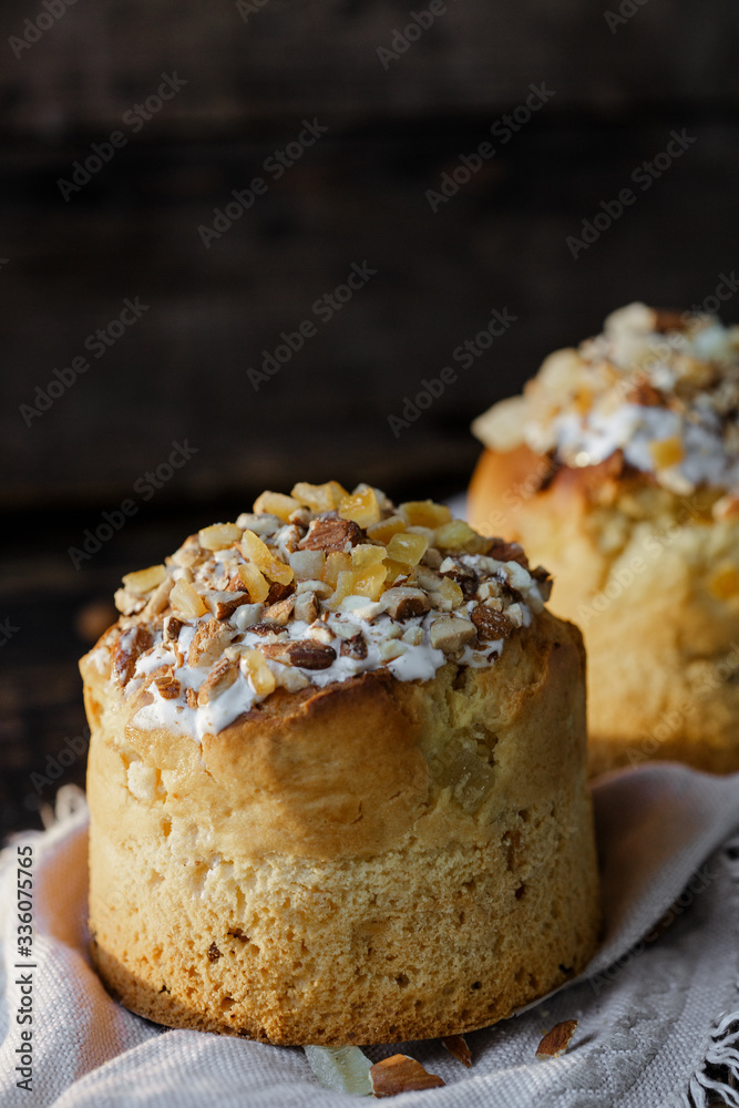 Easter cake. Easter holiday. Freshly baked Easter and decorated on a white towel Easter cake. Easter holiday. Freshly baked Easter and decorated on a white towel