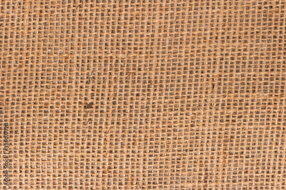 Cream abstract Hessian or sackcloth fabric or hemp sack texture background. Wallpaper of artistic wale linen canvas. Blanket or Curtain of cotton pattern with space for text decoration. Cream abstract Hessian or sackcloth fabric or hemp sack texture background. Wallpaper of artistic wale linen canvas. Blanket or Curtain of cotton pattern with space for text decoration.