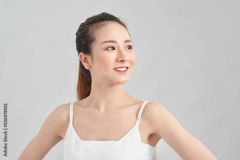 Casual asian young beautiful woman isolated on white background