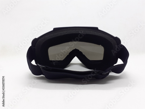 Dark Colored Plastic Modern Goggles for Eye Protection in Motorbike Sport and Paintball Games in White Isolated Background 