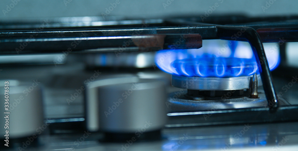 Burning gas burner, kitchen stove fire for cooking.