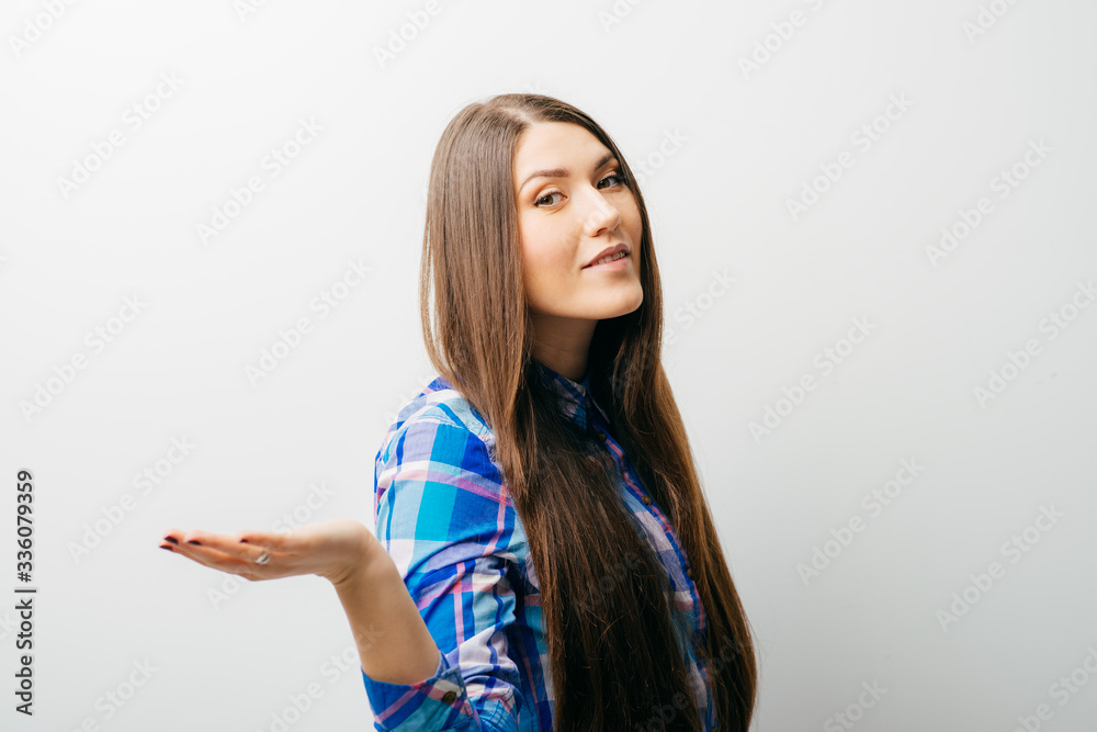 young casual woman with a smile on her face and her arms wide open young casual woman with a smile on her face and her arms wide open
