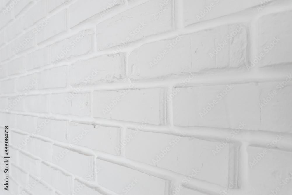 Fototapeta premium different view of the white brick wall,stylish white wall,white brick wall after repair