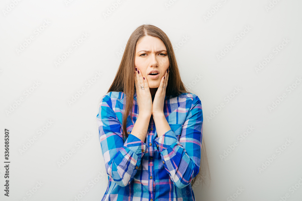 on a white background a young girl toothache on a white background a young girl toothache