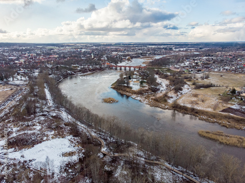 Areal drone photography view of small countryside city Kuldiga, with river Venta. © Artūrs Stiebriņš