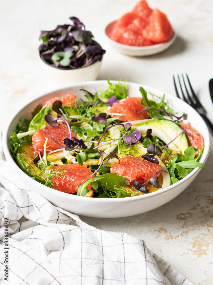 Grapefruit and fennel salad with Dijon mustard dressing and a purple sprouts Grapefruit and fennel salad with Dijon mustard dressing and a purple sprouts