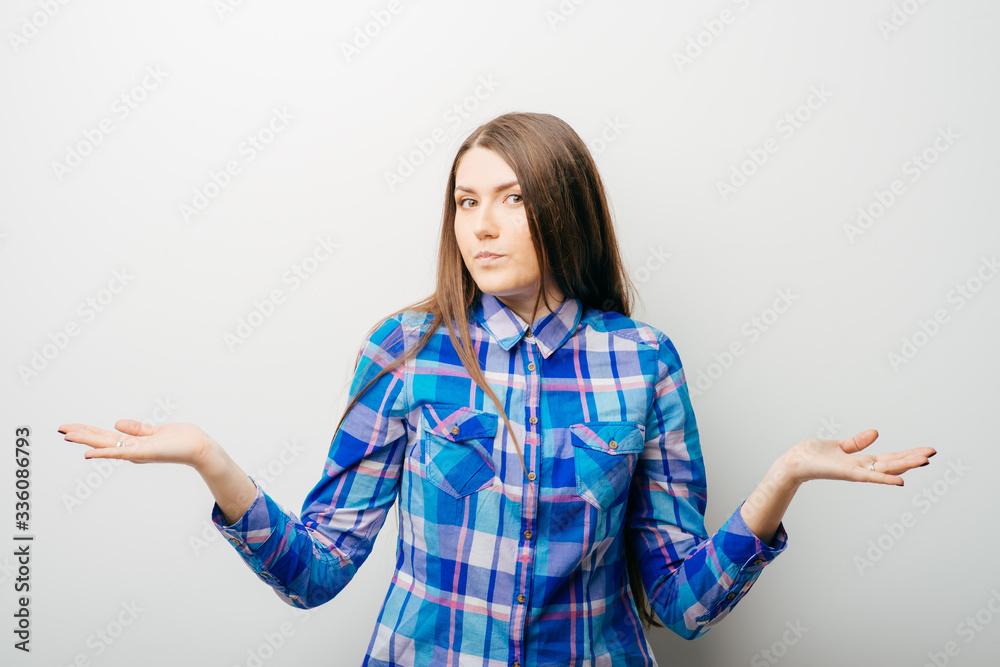 on a white background young girl throws up his hands on a white background young girl throws up his hands