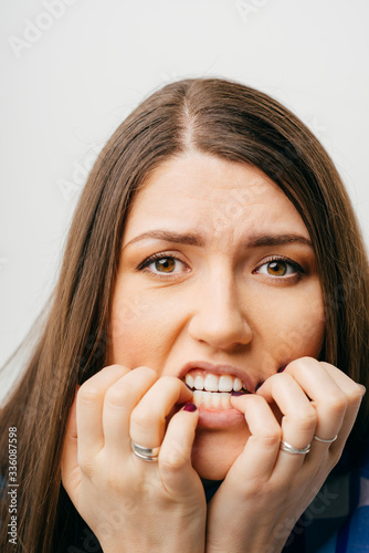 picture of unhappy woman over white