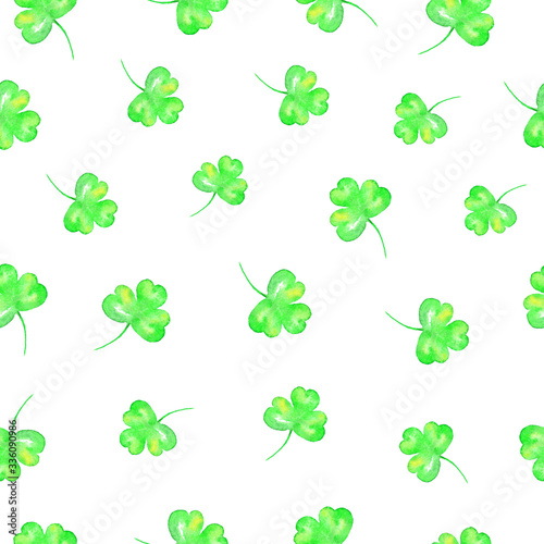 Light green watercolor clover leaves seamless bacground isolated on white