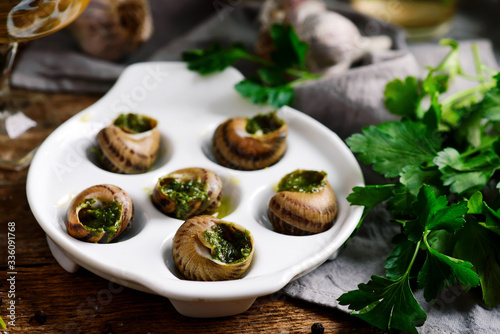 Burgundy escargot with herb butter.style rustic. photo