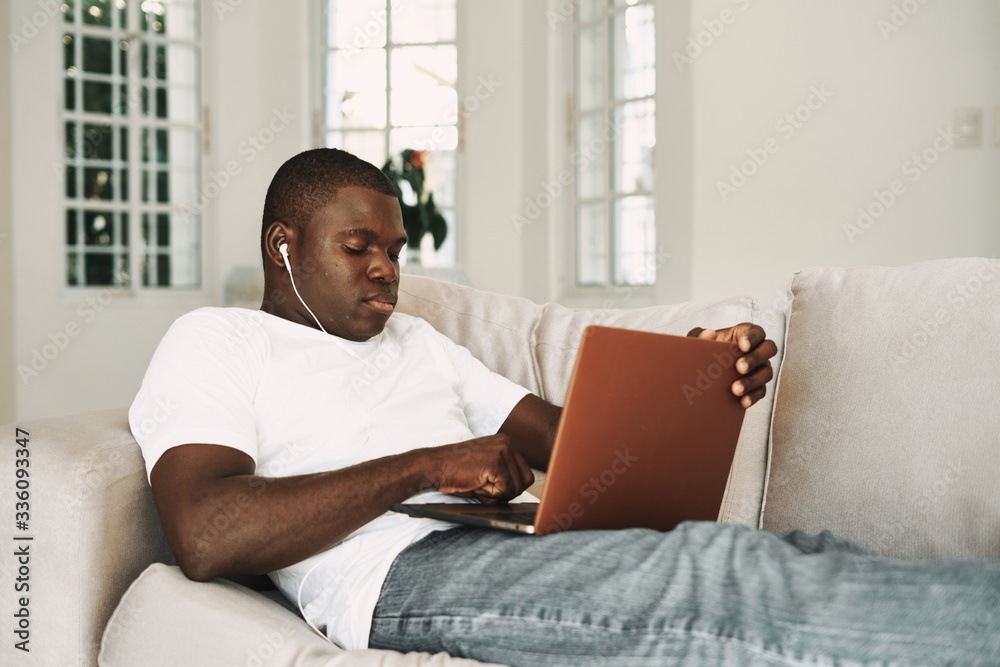 young man using laptop young man using laptop
