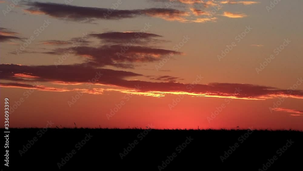 The movement of clouds over the field after sunset. The movement of clouds over the field after sunset.