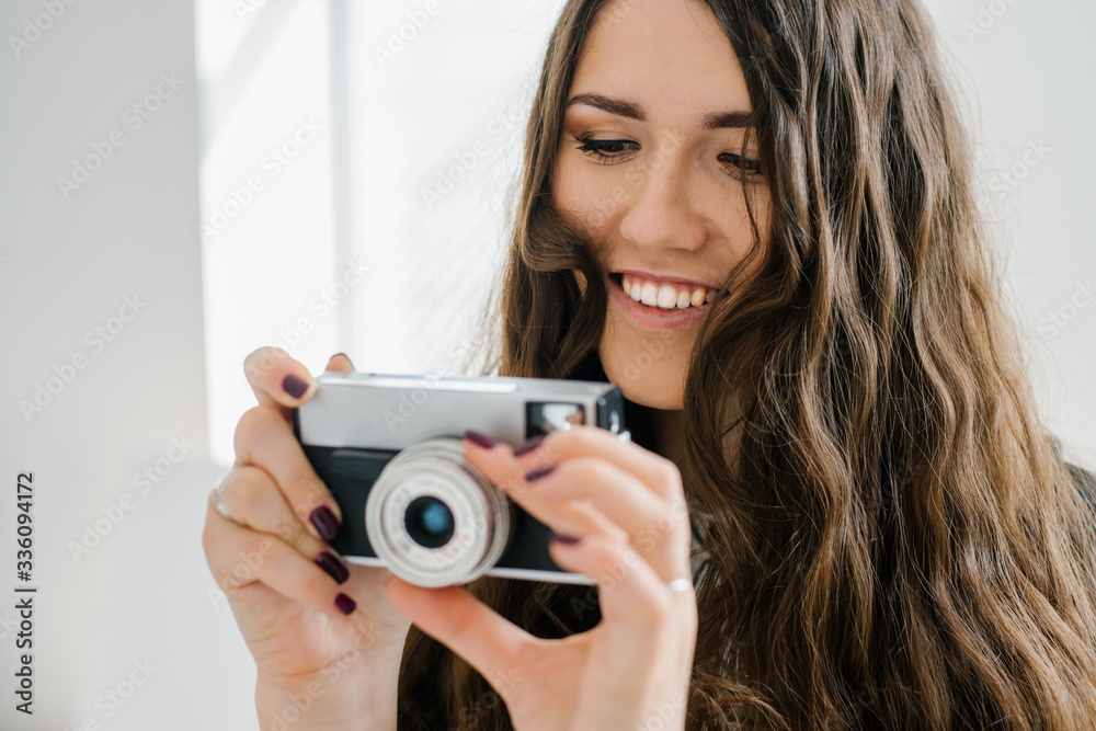 long-haired brunette girl photographed on an old camera long-haired brunette girl photographed on an old camera