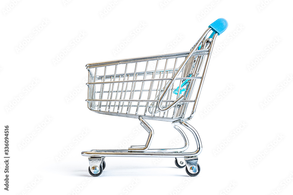 Empty shopping cart close-up isolated on a white background. Consumerism, sale and shopping concept. Empty shopping cart close-up isolated on a white background. Consumerism, sale and shopping concept.