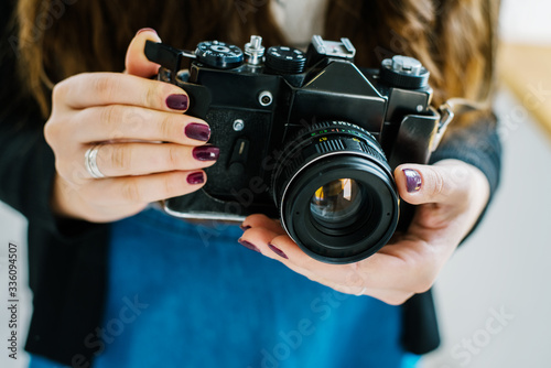 vintage old camera in hand